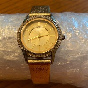 Anne Klein Gold-Tone Crystal Bezel Dress Watch